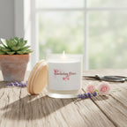 Candle with 'Gardening Peace' label on a white background