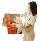 Woman holding a floral painting with a white background
