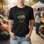 Person wearing a black t-shirt with 'Garden Fresh' graphic at an outdoor market.