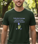 Man wearing a green t-shirt with a motivational quote and flower design outdoors.