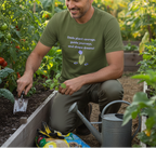Man gardening in a community garden wearing a green t-shirt with a motivational quote.